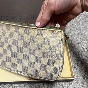 Fair condition, authentic Louis Vuitton bag.